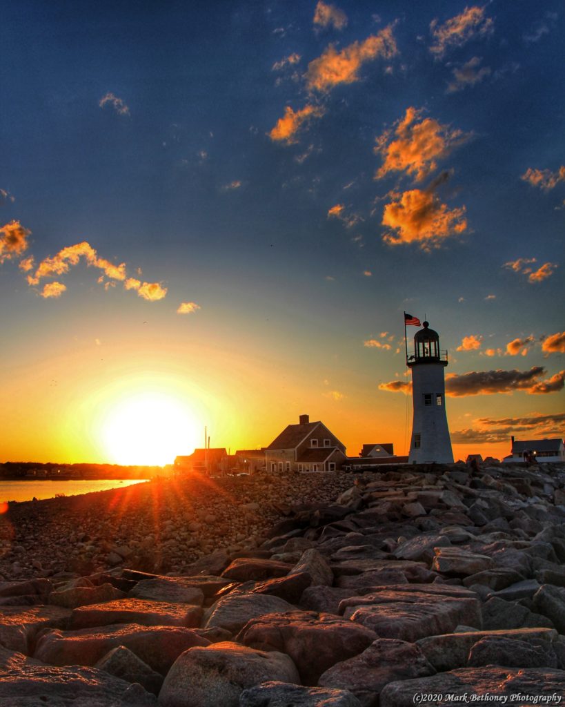 Scituate Light bathed in sunset.