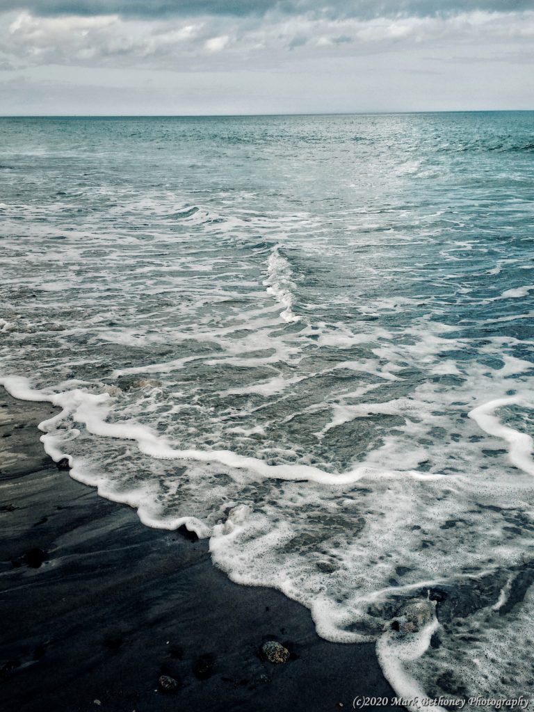 An image depicting ocean waves and views.